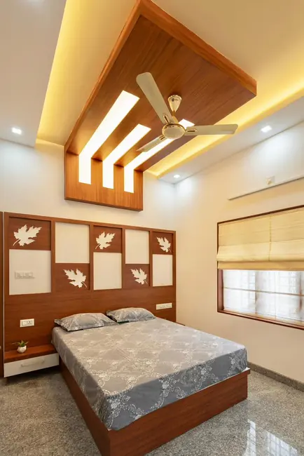 Bedroom interior with custom wood work and ceiling lighting