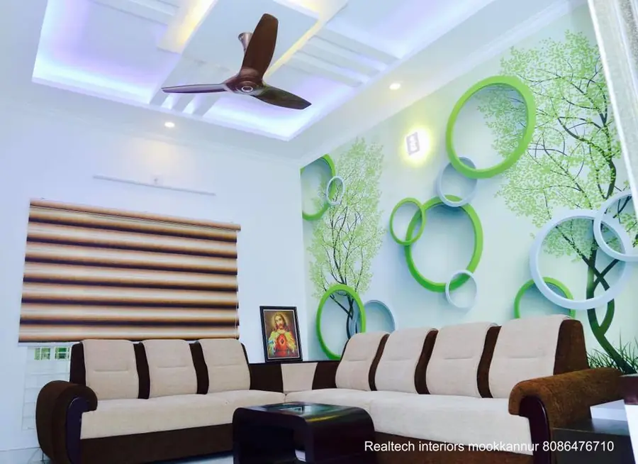 Living room with green tree mural, circular wall decor and sofa set